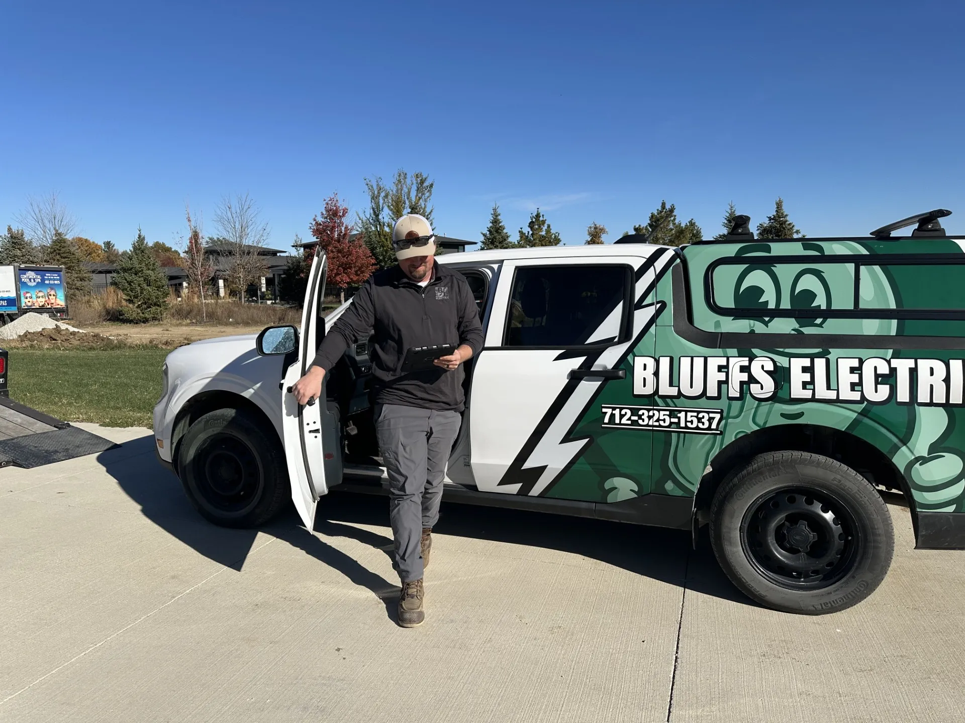 Bluffs Electric service trucks